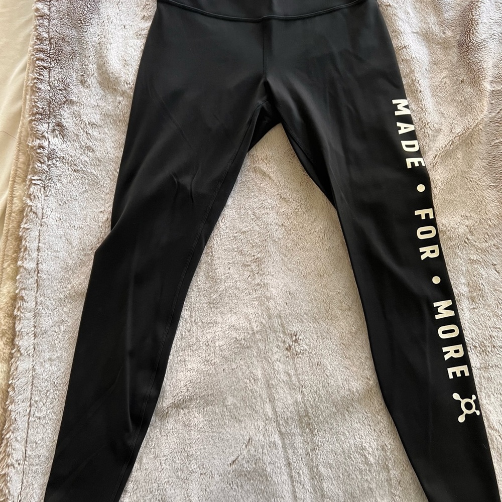 Lululemon Black Align Leggings 28” with Orange Theory White Side text